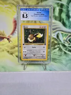 CGC 8.5 Eevee 2000 Team Rocket 1st Edition 55/82 Pokemon Card TCG NM Mint+ - Image 1