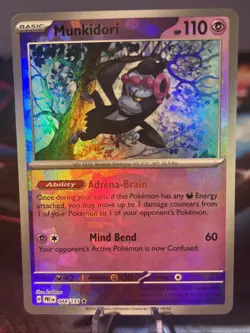 2025 POKEMON PRE EN-PRISMATIC EVOLUTIONS 044 MUNKIDORI POKE BALL HOLO NM/M - Image 1