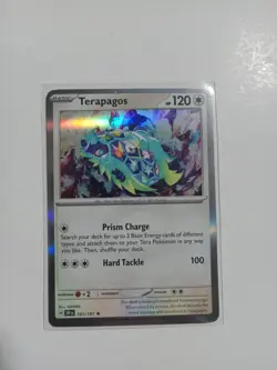 Terapagos 161/191 Surging Sparks Reverse Holo NM Pokemon Card - Image 1