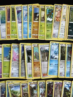 100+ Pokemon Card Lot W/ Mimikyu Tin, Coins, Dice - Image 5