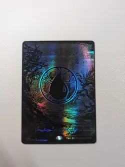 Island (Phyrexian) - Full Art (Oil Slick Raised Foil) Phyrexia: All Will Be One - Image 1