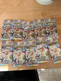 10 packs Pokemon TCG Prismatic Evolutions Random Terastal Festival ex sv8a - Image 1
