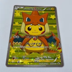 Pikachu in Mega Charizard Y Poncho Promo Pok mon Card Game - Image 1