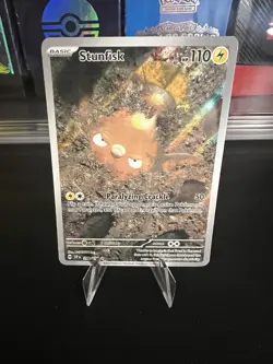 Pokemon Stunfisk 202/191 Sv08: Surging Sparks Illustration Rare Holo Basic HP110 - Image 1