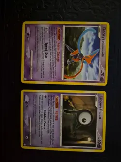 Pokemon Legends Awaken Mini Bundle Unown R 77/146 And Deoxys Speed Forme 26/146 - Image 1