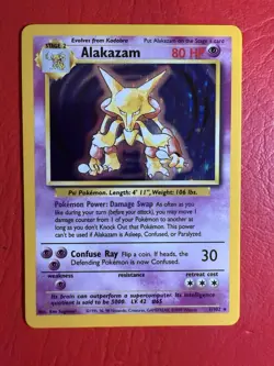 1999 Pokemon Base Set NM/Mint Alakazam Holo Rare 1/102 - Image 1
