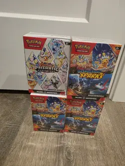 Pokemon TCG Booster Bundle - Prismatic x1 & Surging Sparks x3 New Sealed - Image 1