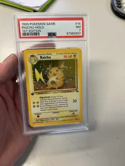 Pokemon TCG Raichu Fossil Holo Rare Card 14/62 1st Edition PSA 7 NM - Image 1