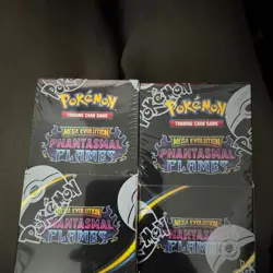 Pokemon TCG: Mega Evolution - Phantasmal Flames Half Booster (18 Packs) In Hand - Image 1