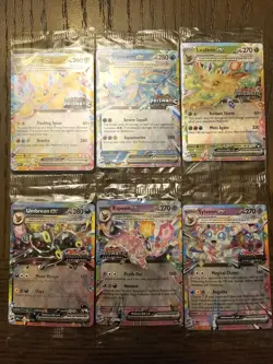 Pokemon TCG SV: Prismatic Evolutions Sealed Stamped Promo Lot - Image 1