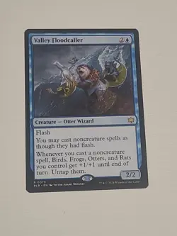 Valley Floodcaller [Bloomburrow] Near Mint - Image 1