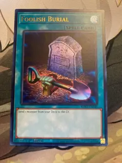 Yugioh! Foolish Burial - 1st Ed Ultra Rare - RA02-EN049 - NM - Image 1