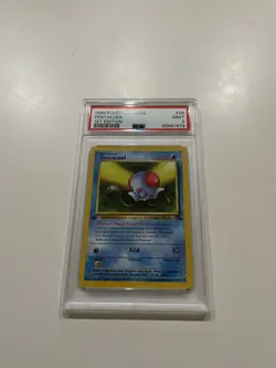 1999 Pokemon PSA 9 MINT Fossil 1st EDITION Card #56 Tentacool 🦑 - Image 1