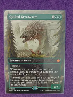 MTG Quilled Greatwurm (Borderless) [Foundations] NM - Image 1