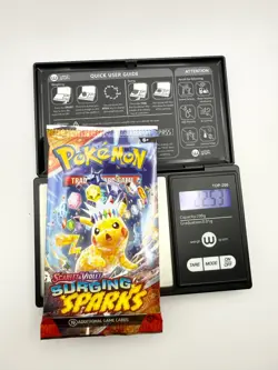 Pokemon Surging Sparks Booster Pack Sealed 22.53g VERY HEAVY - Image 1