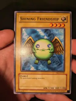 DB2-EN089 Shining Friendship Common UNL Edition Yugioh Card - Image 1