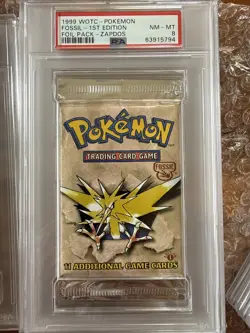 Pokemon 1999 WOTC Fossil 1st Edition Zapdos Sealed Booster Pack PSA 8 - Image 1