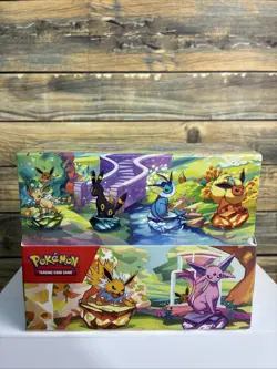 Pokemon TCG Prismatic Evolutions Mini Tin Display Case | 8 Tins / Factory Sealed - Image 1