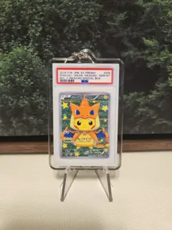 2016 Pokemon Japanese Poncho Pikachu Charizard Gem Mint Gift Keychain 2x3 🔥 - Image 1