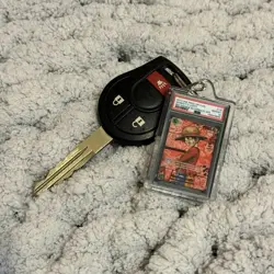 Novelty keychain One Piece x PSA 10 Red Manga Monkey D. Luffy Alternate Art - Image 1
