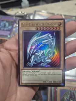 YUGIOH • BLUE EYES WHITE DRAGON • ULTRA RARE • LCKC-EN001 • UNLIMITED • SDK ART - Image 1