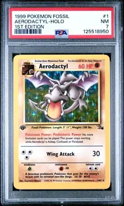 1999 POKEMON FOSSIL 1ST EDITION #1 AERODACTYL - HOLO PSA 7 - Image 1
