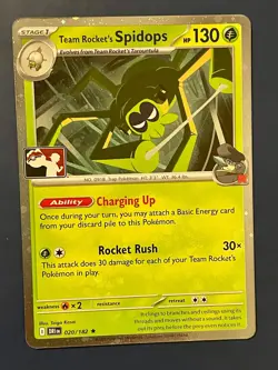Team Rocket's Spidops 020/182 Prize Pack Series Cards Holo Pokemon TCG - Image 1