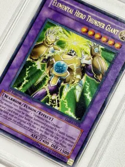Yu-Gi-Oh Elemental HERO Thunder Giant TLM The Lost Millennium 1st Edition PSA 8 - Image 2