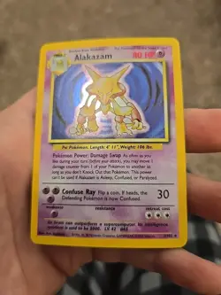 1999 Pokemon TCG Alakazam Base Set Holo Unlimited Rare Card 1/102 LP - Image 1