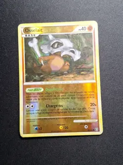 Osselait 60/102 Reverse HGSS Triomphe Carte Pokemon FR - Image 1