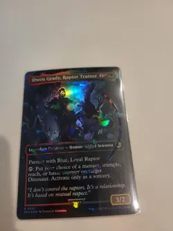 2023 Magic: The Gathering Owen Grady, Raptor Trainer REX Foil - Image 1