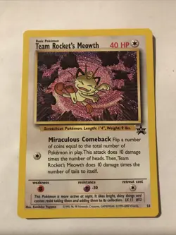Team Rocket's Meowth Black Star Promo Pokemon Card #18 - Image 1