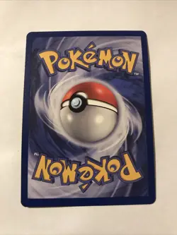 Team Rocket's Meowth Black Star Promo Pokemon Card #18 - Image 2