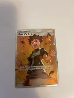 Pokemon Brock's Grit 172/181 Team Up Ultra Rare Full Art Holo Card - Image 1
