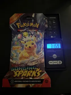 VERY HEAVY - 31.59g - Pokemon Surging Sparks Sleeved Booster Pack - SEALED! - Image 1