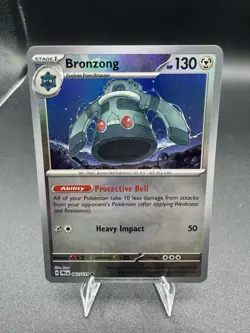 Bronzong (Master Ball Pattern) Holo #067/131 SV: Prismatic Evolutions Pokemon NM - Image 1