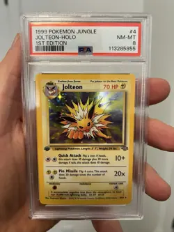 1999 Pokemon PSA 8 1st Edition Jolteon Holo Jungle #4 - Image 1