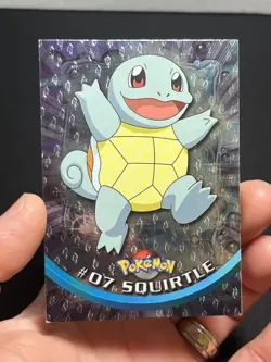 1999 Topps Pokemon Series 1 Squirtle #07 Holo Foil Black Logo Flames - Image 1
