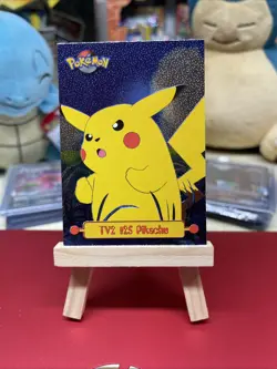Pokemon Topps TV2 #25 Pikachu Embossed Black Logo plus free bonus card🔥 - Image 1