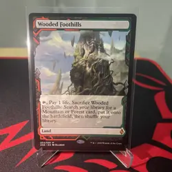 MTG Zendikar Rising Wooded Foothills 004/030 - Image 1