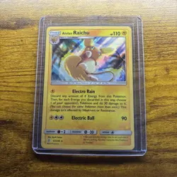 Pokemon TCG Alolan Raichu Holo Rare 57/236 Unified Minds 2019 NM - Image 1