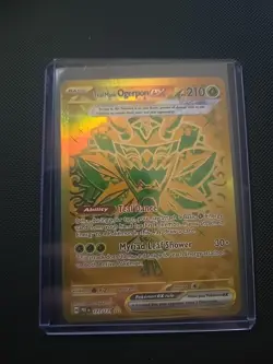 Pokemon Teal Mask Ogerpon ex 177/131 - Gold Secret Rare - Prismatic Evolutions - Image 1