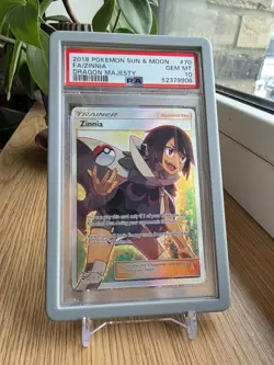 Pokemon Sun & Moon Zinnia (Full Art) 70/70 Dragon Majesty Holo PSA 10 - Image 1