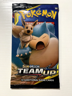 Pokemon Sun & Moon: Team Up Booster Pack Snorlax Eevee art - Image 1