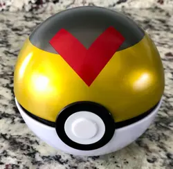 Pokemon Level Ball Tin, Yellow, Black & Red, w/ 50 Assorted Trading Cards - Image 1