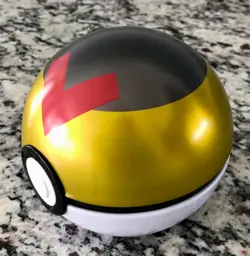 Pokemon Level Ball Tin, Yellow, Black & Red, w/ 50 Assorted Trading Cards - Image 3