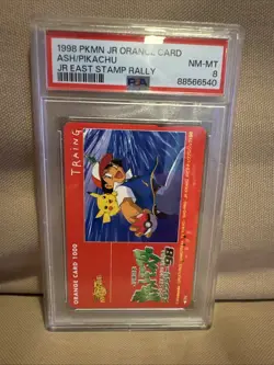 1998 Pokemon Jr Orange Card Ash/Pikachu Jr East Stamp Rally PSA 8 (Pop 1) - Image 1