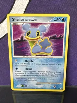 Shellos 79/111 - NM - Rising Rivals Pokemon Card - Tomokazu Komiya Art - Image 1