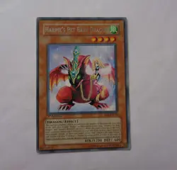 Harpie's Pet Baby Dragon EOJ-EN013 (Rare, 1st Edition, Lightly Played / LP) - Image 1