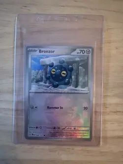 Bronzor (Master Ball) 066/131 Prismatic Evolutions Reverse Holo Pokemon Card - Image 1
